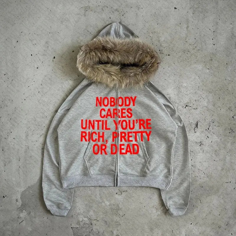NOBODY CARES ZIP HOODIE